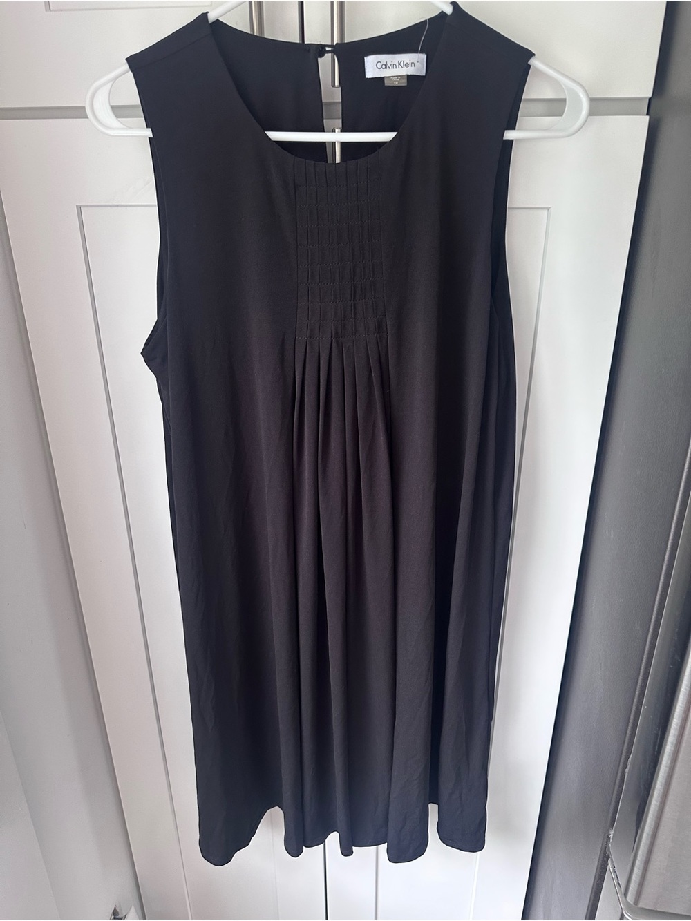Calvin Klein dress features a round neck and pleated front detailing NWT 10